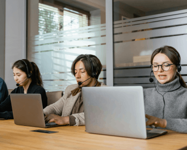 Audio team working on multilingual audio transcription services offer rush delivery for global communication.