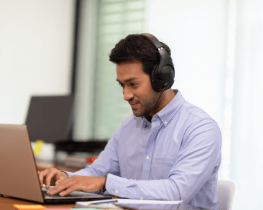 Researcher or educator utilizing trusted Sanskrit transcription services in the USA to enhance their educational materials.