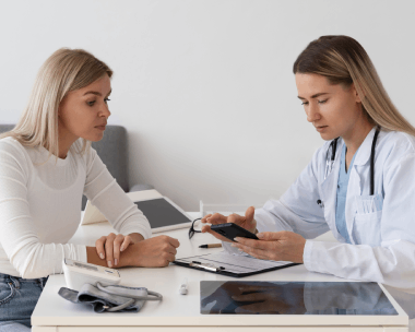 A doctor and our transcriber discussing with high quality medical audio transcription services for healthcare professionals.