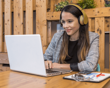 Native Irish transcriber working on an audio file, ensuring accurate transcripts with Irish Transcription Services.