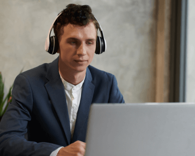 Business executive using professional polish transcription services, boosting productivity during corporate interactions.