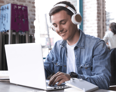 Transcriber working on the sermons multimedia content using sermon transcription services into books and study guides.